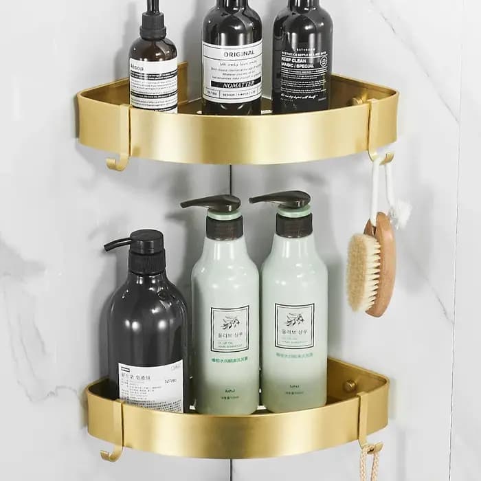 Étagère d'angle de salle de bain en métal doré brossé