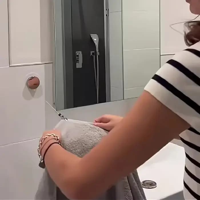 Porte-serviettes rétractable automatique