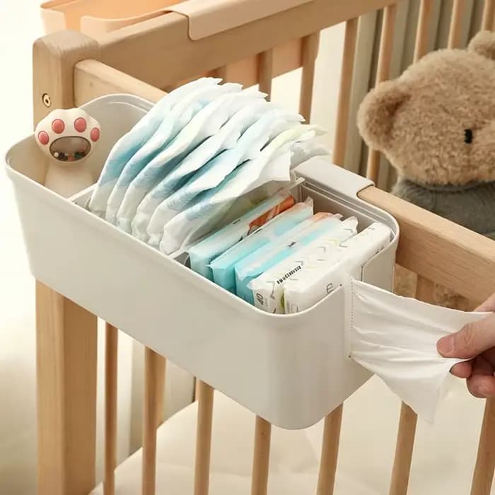 Organisateur multifonctionnel pour lit de bébé