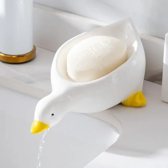 Boîte à savon en forme de canard jaune