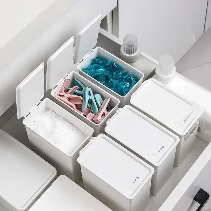 Boîte de rangement pour buanderie blanche avec couvercle anti-poussière