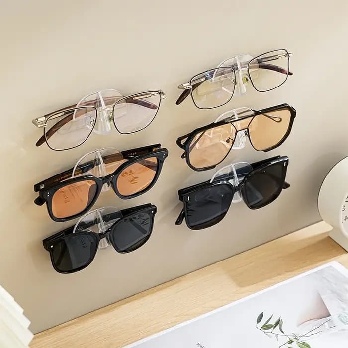 Support mural auto-adhésif pour lunettes