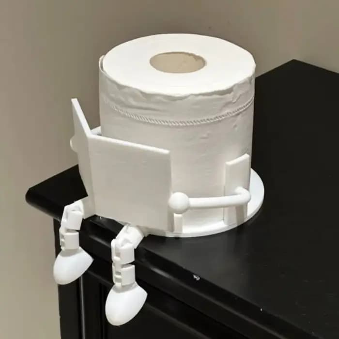 Un porte-papier hygiénique de lecture amusante, distributeur de rouleaux de salle de bain qui combin