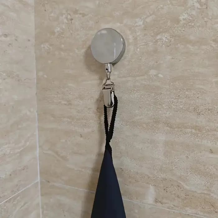 Porte-serviettes rétractable automatique