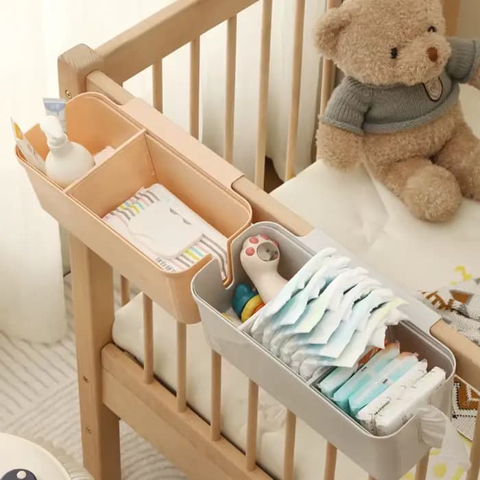 Organisateur multifonctionnel pour lit de bébé