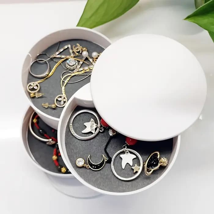 Boîte de rangement de bureau rotative multicouche pour accessoires capillaires