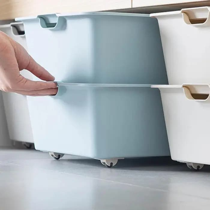 Roulettes auto-adhésives pour boîte de rangement