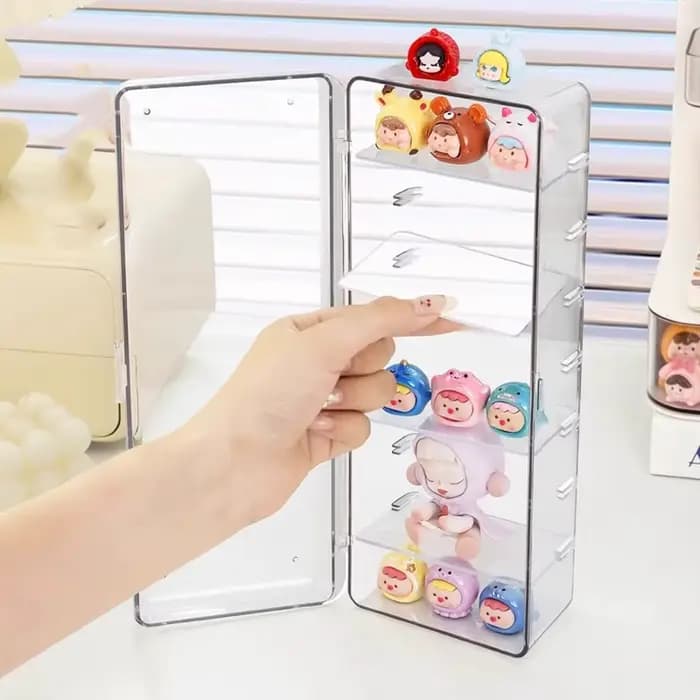 Une boîte de rangement multicouche anti-poussière avec une jolie petite vitrine