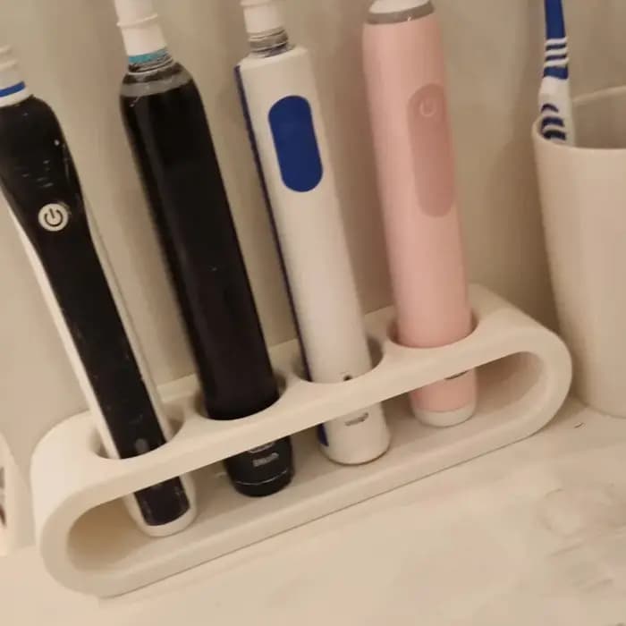 Support de rangement pour brosses à dents électriques de salle de bain