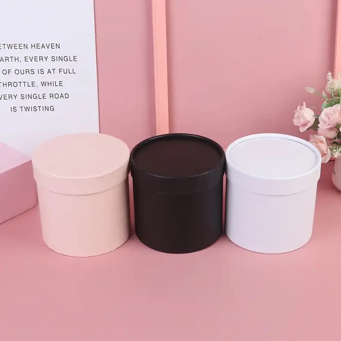 Boîtes rondes en papier à fleurs