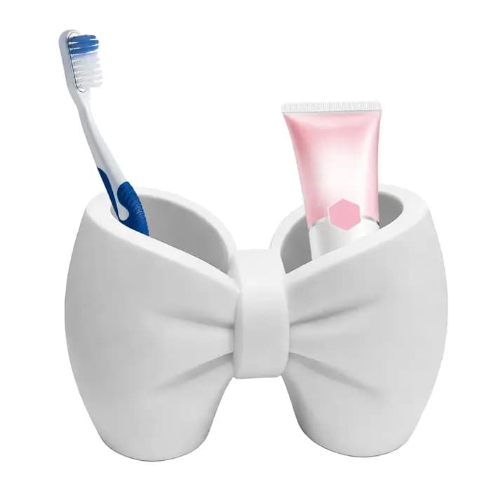 Porte-brosse à dents en forme d'arc