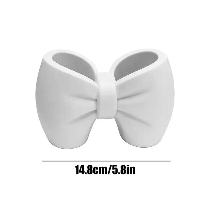 Porte-brosse à dents en forme d'arc