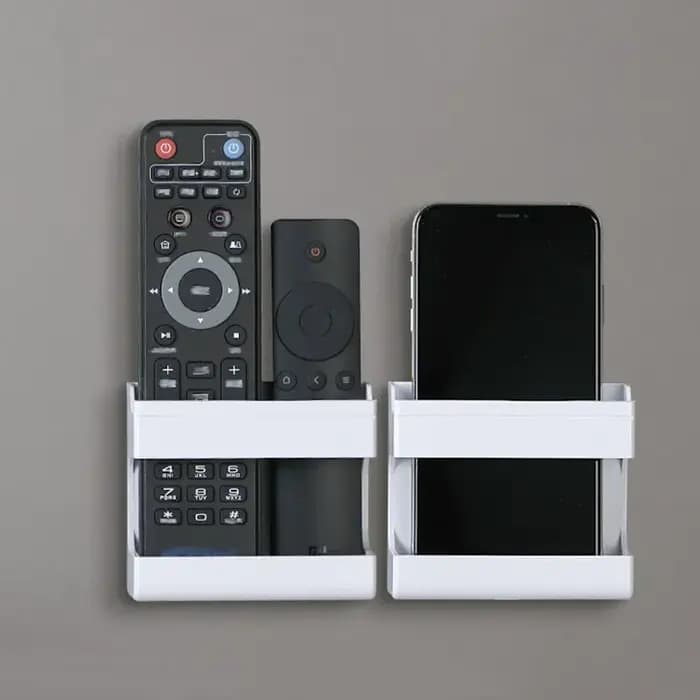 Organisateur mural multifonctionnel pour télécommandes et téléphones mobiles