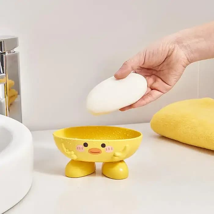 Porte-savon avec vidange en forme de canard