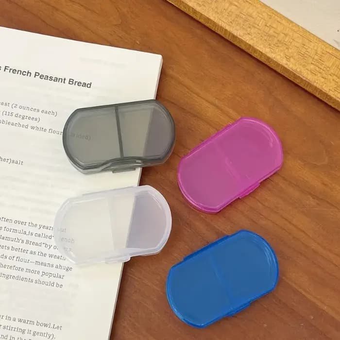 Boîte à pilules transparente à 2 compartiments