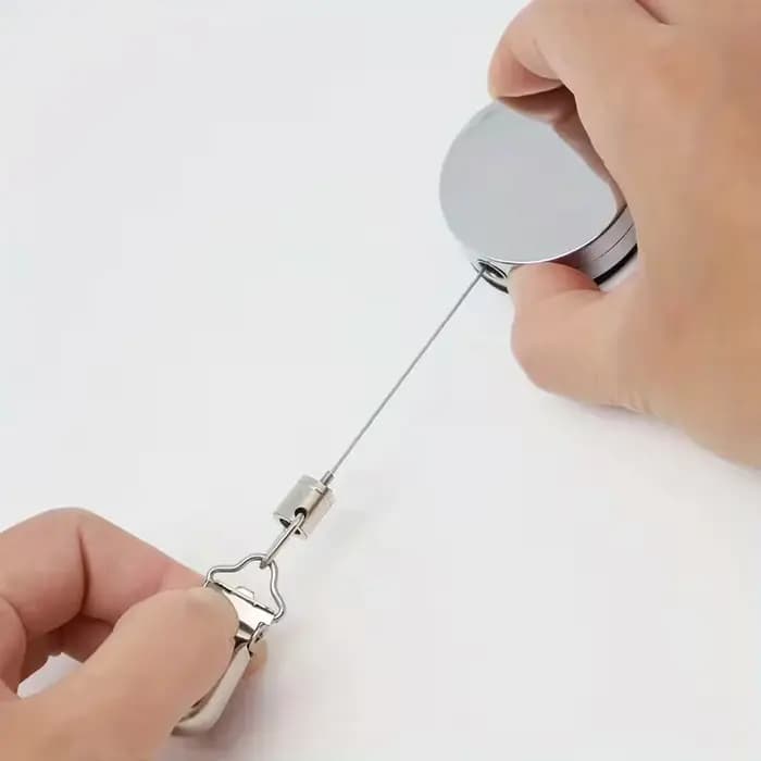 Porte-serviettes rétractable automatique