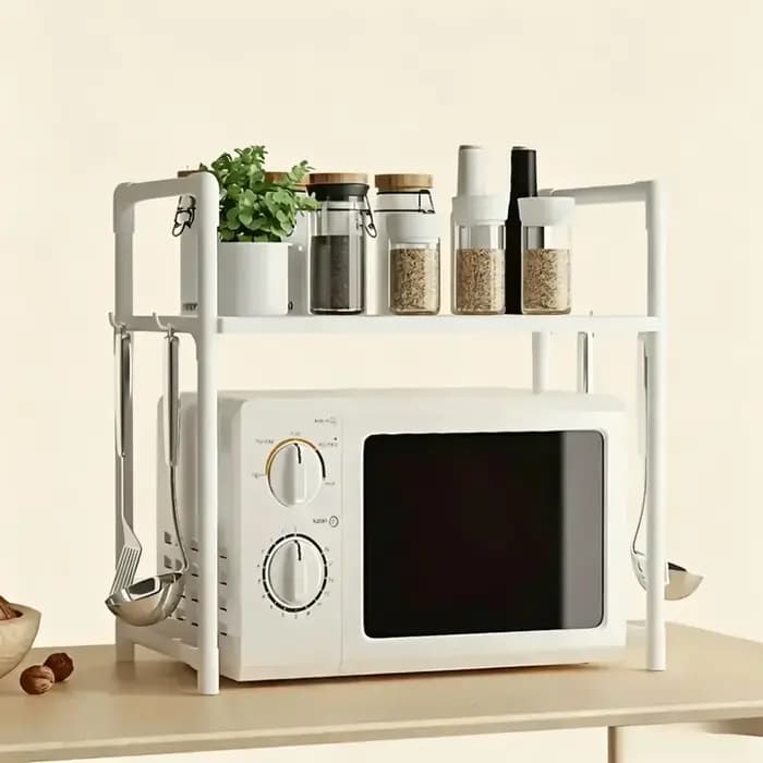 Le support de rangement multifonctionnel monocouche pour four à micro-ondes est simple et élégant