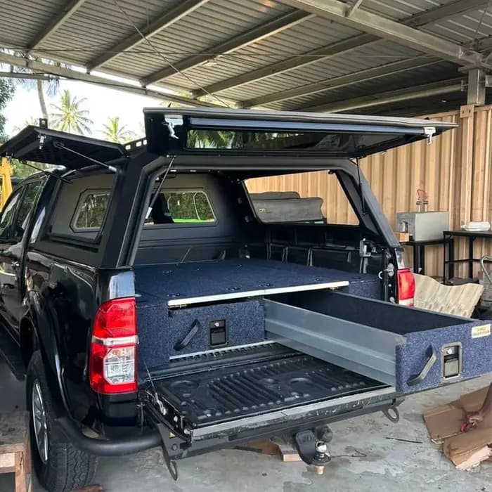 Système de rangement pour coffre de voiture