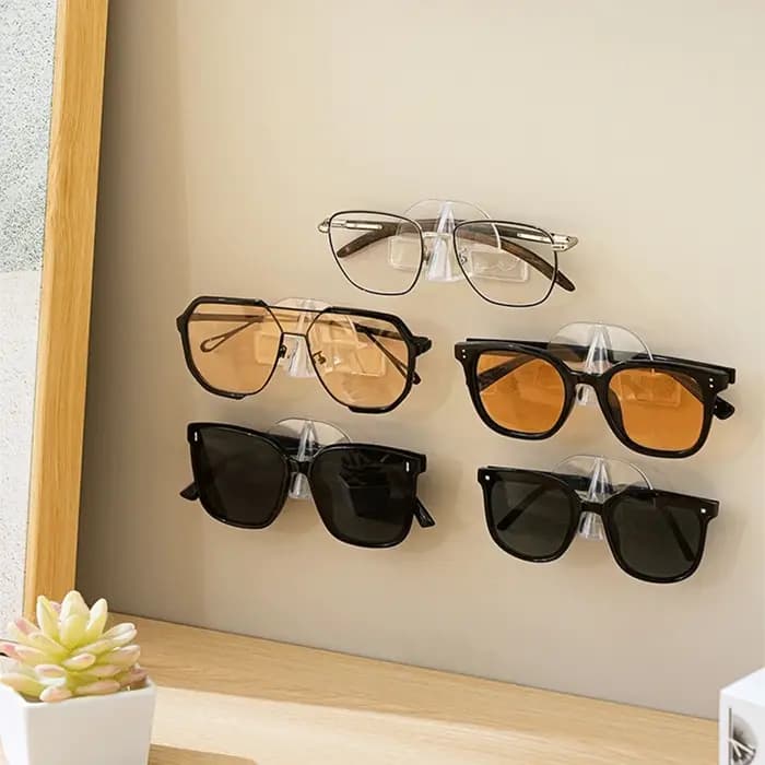 Support mural auto-adhésif pour lunettes