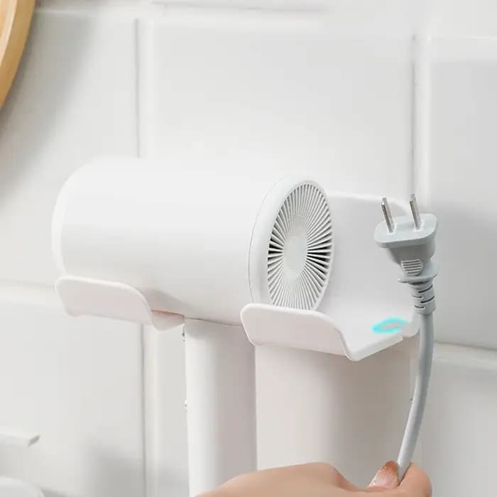 Support de placement pour sèche-cheveux