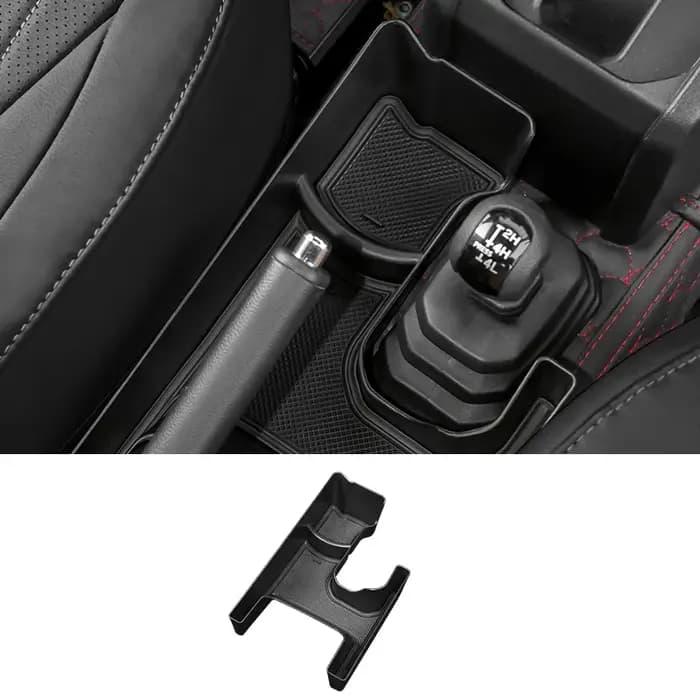 Boîte de rangement latérale pour manette de vitesse