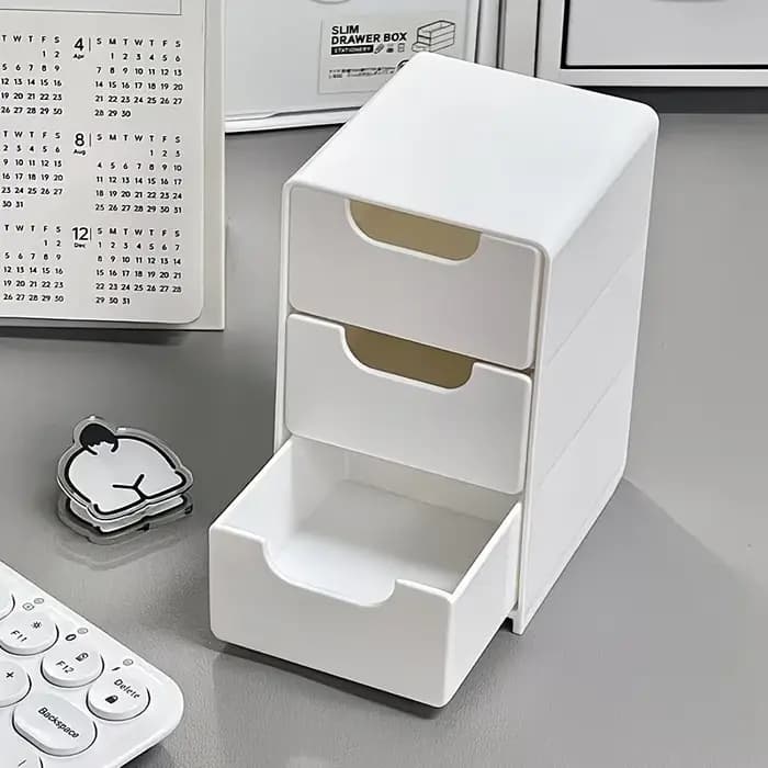 Boîte de rangement à trois niveaux de type tiroir