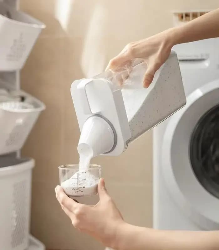 Distributeur hermétique de détergent à lessive