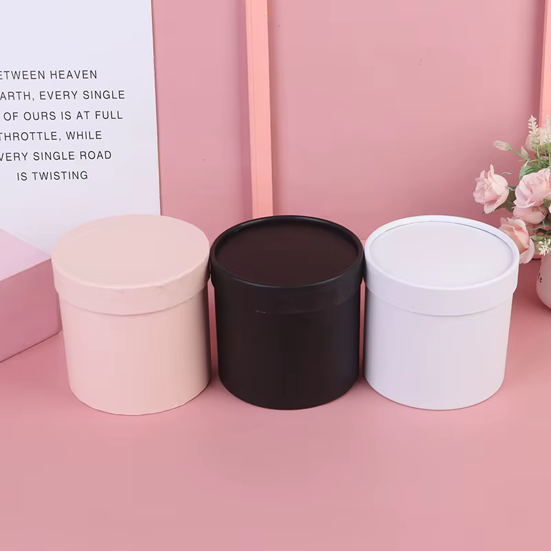 Boîtes rondes en papier à fleurs