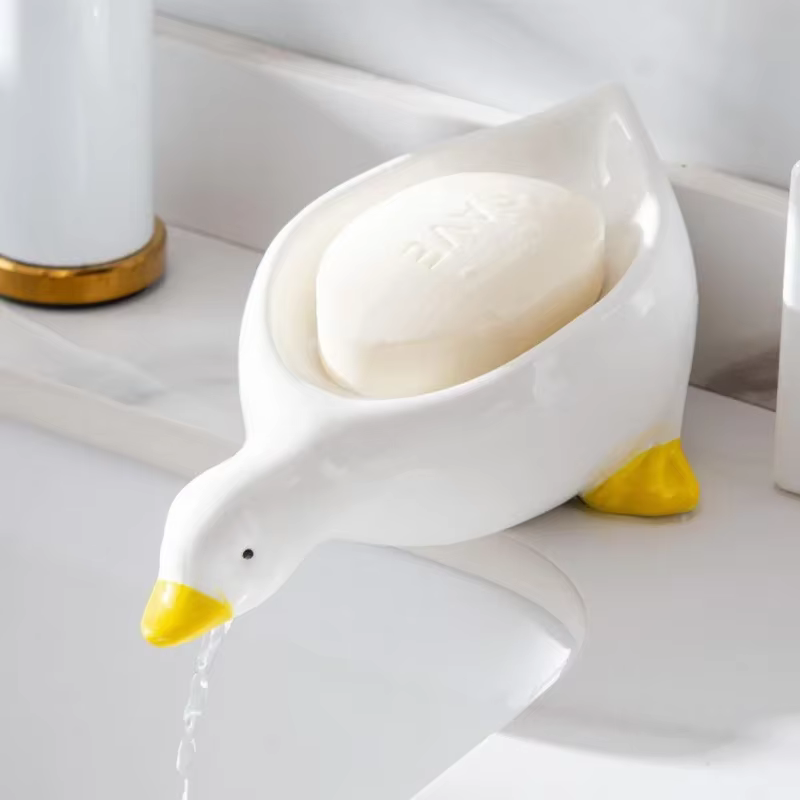 Boîte à savon en forme de canard jaune