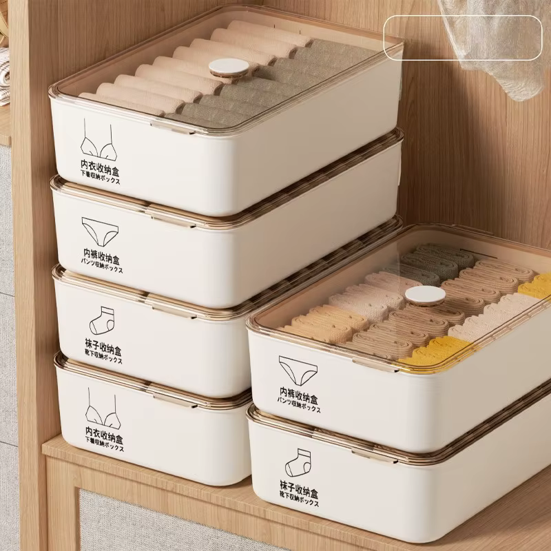 La nouvelle boîte de rangement pour sous-vêtements est un organisateur de vêtements intimes trois en un pour un usage domestique