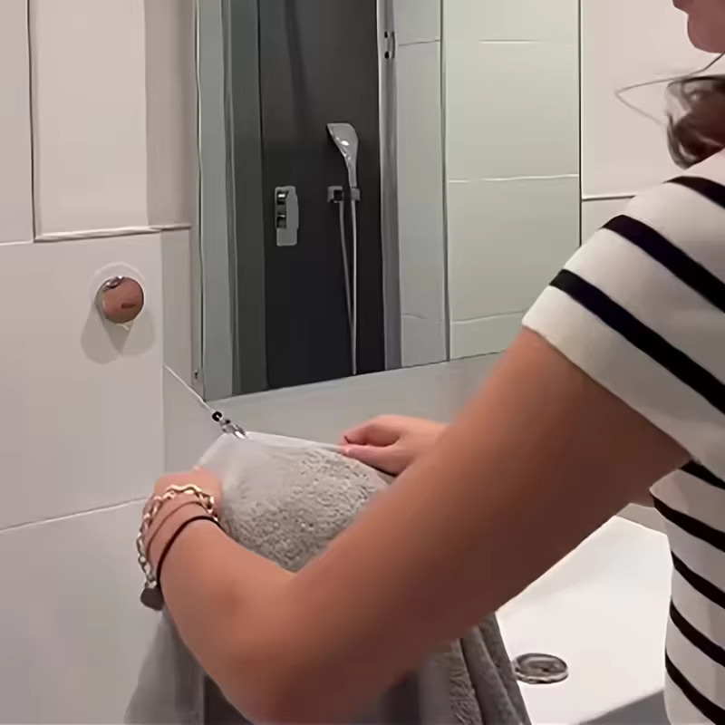 Porte-serviettes rétractable automatique
