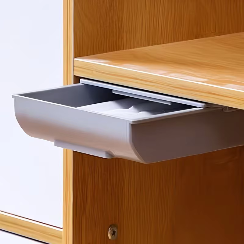 1 boîte de rangement cachée sous le bureau